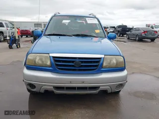 2004 Suzuki Grand Vitara with VIN JS3TE62V544100539, listed as a IAAI auction lot 41900314 with 192,776 mi miles. Bid and sale history available at carsss.com. Image 12.