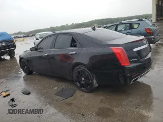 2014 Cadillac CTS Premium AWD with VIN 1G6AZ5S37E0131094, listed as a Copart auction lot 59180975 with 119,592 mi miles and Salvage title. Bid and sale history available at DreamBid. Image 2.
