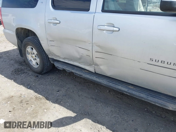 2013 Chevrolet Suburban LT with VIN 1GNSKJE78DR108955, listed as a IAAI auction lot 42004032 with 114,729 mi miles and . Bid and sale history available at DreamBid. Image 17.