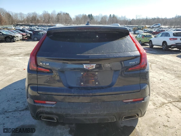2023 Cadillac XT4 FWD Luxury with VIN 1GYAZAR47PF174705, listed as a Copart auction lot 41932365 with 34,227 mi miles and Salvage Title. Bid and sale history available at carsss.com. Image 6.
