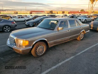 1988 Mercedes-Benz 560 with VIN WDBCA39D4JA391164, listed as a Copart auction lot 82628704 with 88,482 mi miles and Clean Title. Bid and sale history available at DreamBid. Image 1.