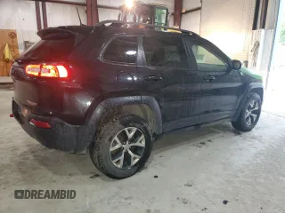 2016 Jeep Cherokee Trailhawk with VIN 1C4PJMBS7GW337774, listed as a Copart auction lot 55184885 with 161,567 mi miles and Salvage title. Bid and sale history available at DreamBid. Image 3.