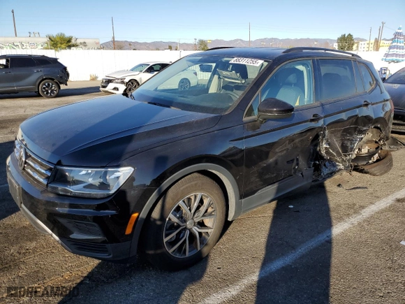 2021 Volkswagen Tiguan S with VIN 3VV1B7AX7MM015070, listed as a Copart auction lot 88311255 with 58,325 mi miles and Salvage Title. Bid and sale history available at carsss.com. Image 1.
