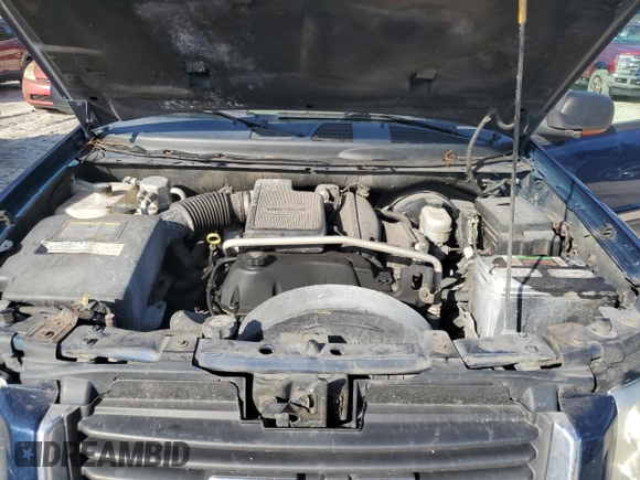 2004 GMC Envoy SLT with VIN 1GKDS13S042311327, listed as a Copart auction lot 42736995 with 235,164 mi miles and Salvage Title. Bid and sale history available at carsss.com. Image 12.
