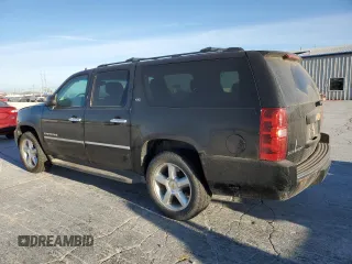 2012 Chevrolet Suburban LTZ with VIN 1GNSKKE71CR310010, listed as a Copart auction lot 48943445 with 311,512 mi miles and Clean title. Bid and sale history available at DreamBid. Image 2.