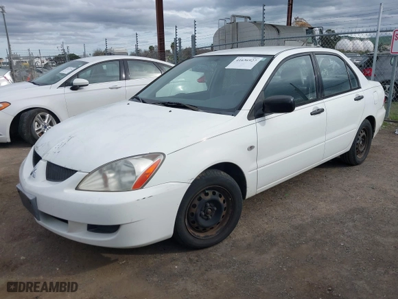 2004 Mitsubishi Lancer ES with VIN JA3AJ26E74U060371, listed as a IAAI auction lot 41636927 with 165,456 mi miles. Bid and sale history available at carsss.com. Image 17.