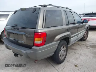 1999 Jeep Grand Cherokee Laredo с VIN 1J4G258S8XC650533, выставлен на аукционе IAAI как лот 41583331 с пробегом 245 164 миль миль и . История ставок и продаж доступна на DreamBid. Изображение 4.