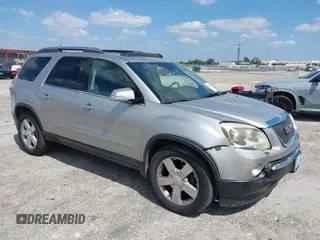 2007 GMC Acadia SLT with VIN 1GKEV33727J126936, listed as a IAAI auction lot 42059595 with 129,700 mi miles. Bid and sale history available at carsss.com. Image 1.