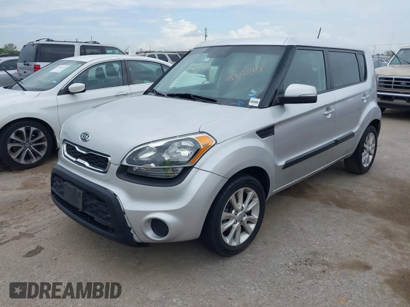 2012 Kia Soul + with VIN KNDJT2A60C7377305, listed as a IAAI auction lot 41902069 with 76,217 mi miles. Bid and sale history available at carsss.com. Image 2.
