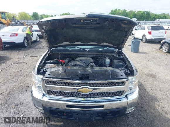 2012 Chevrolet Silverado 1500 LT with VIN 1GCRKSE77CZ197333, listed as a IAAI auction lot 42081096 with 104,928 mi miles and . Bid and sale history available at DreamBid. Image 10.