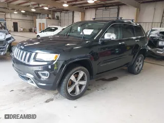 2014 Jeep Grand Cherokee Overland with VIN 1C4RJFCM4EC386398, listed as a IAAI auction lot 41696113 with 119,110 mi miles. Bid and sale history available at carsss.com. Image 17.