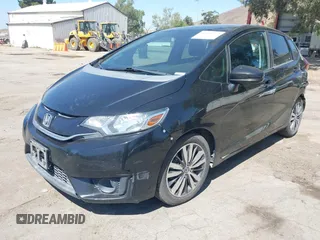 2015 Honda Fit EX-L z VIN 3HGGK5H88FM706513, wystawiony jako IAAI lot #42493772 z przebiegiem 173 129 mil mil oraz . Historia ofert i sprzedaży dostępna na DreamBid. Obrazek 18.