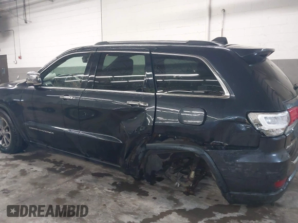2014 Jeep Grand Cherokee Limited z VIN 1C4RJFBG2EC363245, wystawiony jako IAAI lot #42341795 z przebiegiem 157 366 mil mil oraz . Historia ofert i sprzedaży dostępna na DreamBid. Obrazek 6.