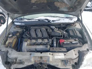 2004 Mercury Sable LS Premium with VIN 1MEFM55S04A619587, listed as a IAAI auction lot 41571950 with 125,444 mi miles and . Bid and sale history available at DreamBid. Image 10.