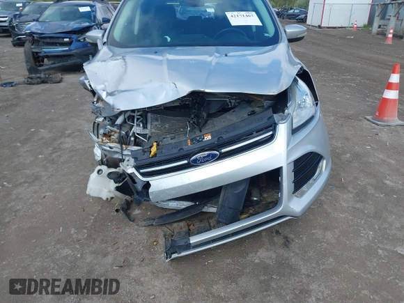 2015 Ford Escape Titanium z VIN 1FMCU9J99FUC75852, wystawiony jako IAAI lot #42171467 z przebiegiem 113 322 mil mil oraz . Historia ofert i sprzedaży dostępna na DreamBid. Obrazek 6.