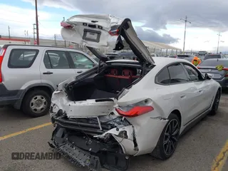2023 BMW i4 eDrive40 z VIN WBY73AW05PFR28279, wystawiony jako IAAI lot #41262952 z przebiegiem 40 011 mil mil oraz . Historia ofert i sprzedaży dostępna na DreamBid. Obrazek 4.