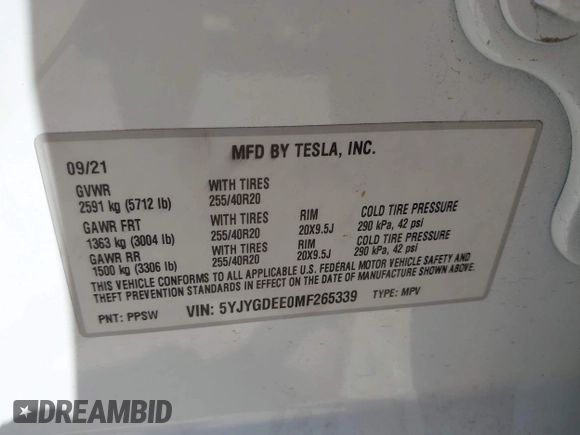 2021 Tesla Model Y Long Range with VIN 5YJYGDEE0MF265339, listed as a IAAI auction lot 41975058 with 51,292 mi miles and . Bid and sale history available at DreamBid. Image 9.