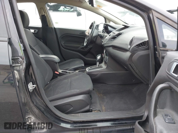 2015 Ford Fiesta SE z VIN 3FADP4EJ3FM115466, wystawiony jako IAAI lot #41849165 z przebiegiem 178 002 mil mil oraz . Historia ofert i sprzedaży dostępna na DreamBid. Obrazek 5.
