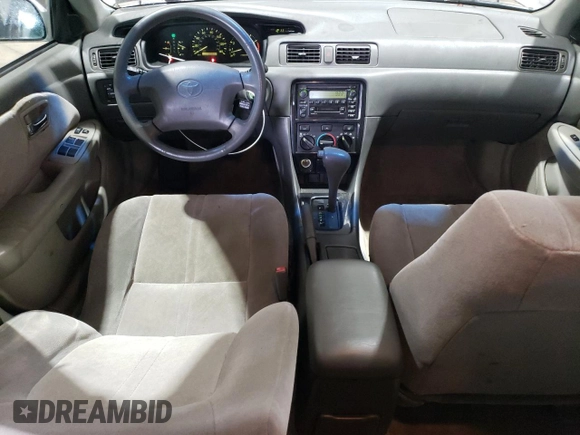 2001 Toyota Camry CE z VIN JT2BG22K410558183, wystawiony jako Copart lot #55600625 z przebiegiem 69 689 mil mil oraz Szkoda całkowita • Salvage title. Historia ofert i sprzedaży dostępna na DreamBid. Obrazek 8.