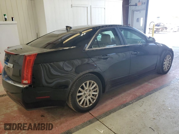 2013 Cadillac CTS Luxury z VIN 1G6DG5E57D0112818, wystawiony jako Copart lot #57937755 z przebiegiem 148 751 mil mil oraz Czysty tytuł • Clean title. Historia ofert i sprzedaży dostępna na DreamBid. Obrazek 3.