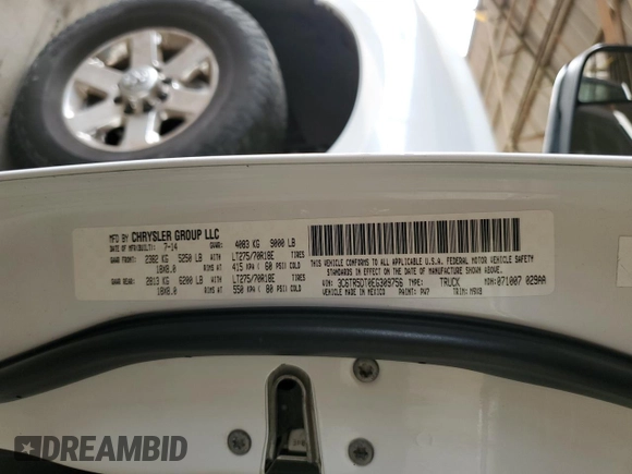2014 Ram 2500 SLT with VIN 3C6TR5DT0EG309756, listed as a Copart auction lot 51149685 with 163,472 mi miles and Salvage title. Bid and sale history available at DreamBid. Image 12.
