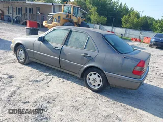 1997 Mercedes-Benz C with VIN WDBHA28E7VA496104, listed as a IAAI auction lot 42773052 with 258,692 mi miles and . Bid and sale history available at DreamBid. Image 3.