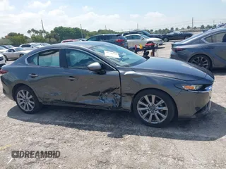 2023 Mazda 3 S Preferred with VIN 3MZBPACM8PM361196, listed as a IAAI auction lot 41940018 with 49,759 mi miles and . Bid and sale history available at DreamBid. Image 18.