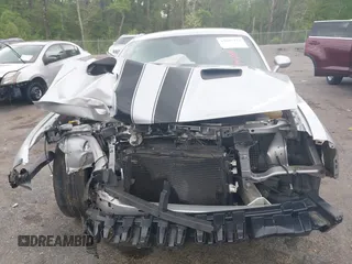 2019 Dodge Challenger SXT z VIN 2C3CDZAG9KH744703, wystawiony jako IAAI lot #41881944 z przebiegiem Nie podano mil oraz . Historia ofert i sprzedaży dostępna na DreamBid. Obrazek 6.