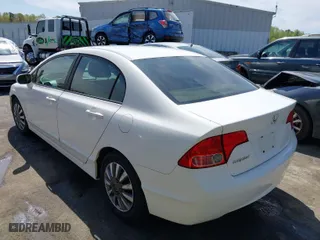 2008 Honda Civic Sdn LX with VIN 1HGFA165X8L119752, listed as a IAAI auction lot 41941224 with 239,921 mi miles. Bid and sale history available at carsss.com. Image 3.