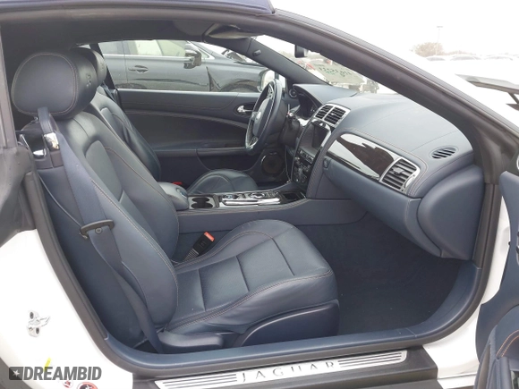 2014 Jaguar XK with VIN SAJWA4EC9EMB52042, listed as a IAAI auction lot 41635233 with 10,566 mi miles. Bid and sale history available at carsss.com. Image 5.