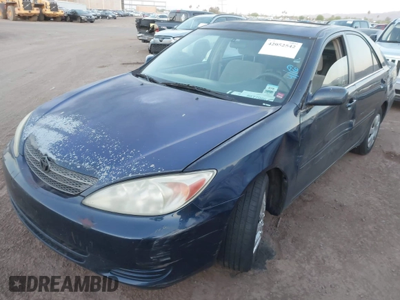 2004 Toyota Camry LE with VIN 4T1BE32K54U260916, listed as a IAAI auction lot 42052542 with 260,721 mi miles and . Bid and sale history available at carsss.com. Image 2.
