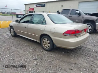 2002 Honda Accord EX z VIN 1HGCG56632A133738, wystawiony jako IAAI lot #42104355 z przebiegiem 236 202 mil mil oraz . Historia ofert i sprzedaży dostępna na DreamBid. Obrazek 3.