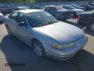 2004 Oldsmobile Alero GL1 z VIN 1G3NL52E54C196878, wystawiony jako IAAI lot #42357662 z przebiegiem Nie podano mil oraz . Historia ofert i sprzedaży dostępna na DreamBid. Obrazek 1.