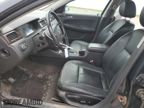 2014 Chevrolet Impala LTZ with VIN 2G1WC5E3XE1185115, listed as a Copart auction lot 60690785 with 119,947 mi miles and Salvage title. Bid and sale history available at DreamBid. Image 7.