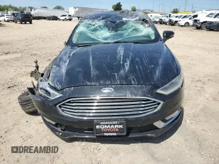 2017 Ford Fusion Hybrid SE с VIN 3FA6P0LU4HR252582, выставлен на аукционе Copart как лот 57965815 с пробегом Не указан миль и Списание • Salvage title. История ставок и продаж доступна на DreamBid. Изображение 5.