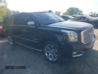 2015 GMC Yukon XL Denali with VIN 1GKS1JKJ5FR653076, listed as a IAAI auction lot 42072132 with 288,568 mi miles. Bid and sale history available at carsss.com. Image 1.