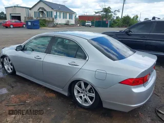 2004 Acura TSX w/Navigation z VIN JH4CL95984C024100, wystawiony jako IAAI lot #42309198 z przebiegiem 210 981 mil mil oraz . Historia ofert i sprzedaży dostępna na DreamBid. Obrazek 3.