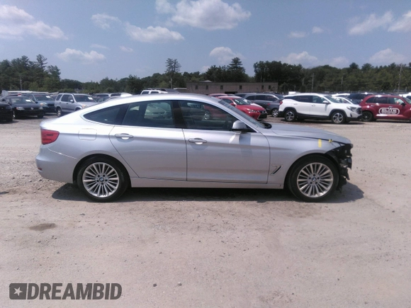 2014 BMW 3 Series 328i Gran Turismo xDrive z VIN WBA3X5C58ED558625, wystawiony jako IAAI lot #42473401 z przebiegiem 106 419 mil mil oraz . Historia ofert i sprzedaży dostępna na DreamBid. Obrazek 14.