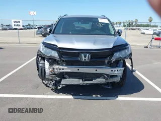 2021 Honda Pilot Special Edition with VIN 5FNYF6H27MB094704, listed as a IAAI auction lot 41953899 with 55,462 mi miles and . Bid and sale history available at DreamBid. Image 13.