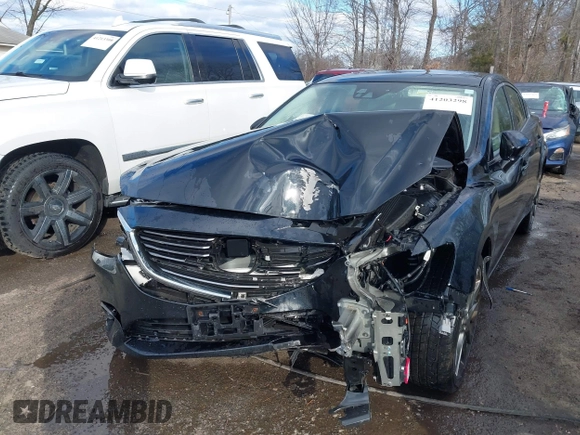 2016 Mazda 6 i Grand Touring with VIN JM1GJ1W54G1454115, listed as a IAAI auction lot 41203298 with 104,632 mi miles and . Bid and sale history available at DreamBid. Image 6.