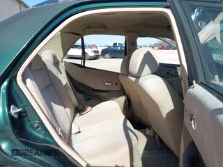 2001 Mazda Protege LX with VIN JM1BJ225310404647, listed as a IAAI auction lot 41480466 with 115,606 mi miles and . Bid and sale history available at carsss.com. Image 8.