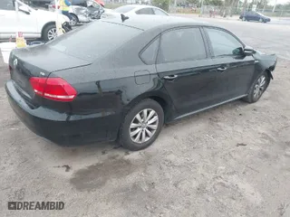 2015 Volkswagen Passat 1.8T S with VIN 1VWAT7A31FC019965, listed as a IAAI auction lot 41620572 with 145,141 mi miles. Bid and sale history available at carsss.com. Image 4.