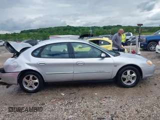 2003 Ford Taurus SES Standard z VIN 1FAFP55S43G270637, wystawiony jako IAAI lot #42205556 z przebiegiem 171 286 mil mil oraz . Historia ofert i sprzedaży dostępna na DreamBid. Obrazek 14.