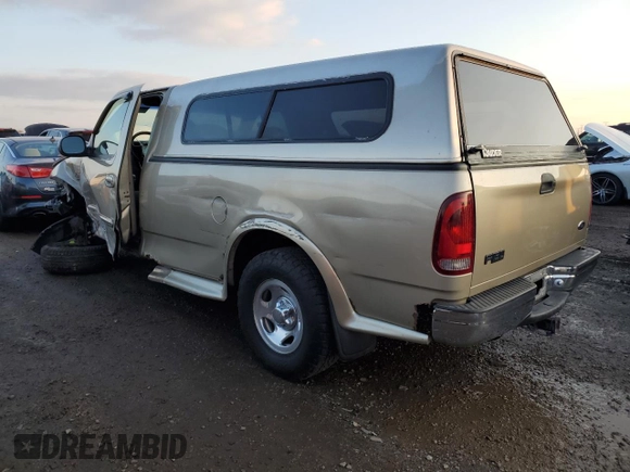2000 Ford F-150 XL with VIN 1FTRF17W7YNB07289, listed as a Copart auction lot 80981994 with 189,969 mi miles and Salvage title. Bid and sale history available at DreamBid. Image 2.