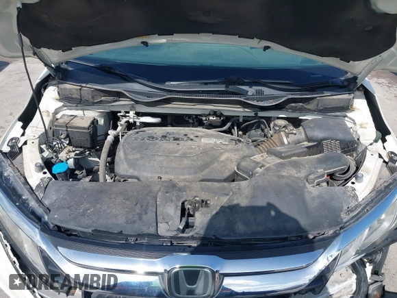 2018 Honda Odyssey EX with VIN 5FNRL6H57JB100035, listed as a IAAI auction lot 42582758 with 88,585 mi miles and . Bid and sale history available at DreamBid. Image 10.