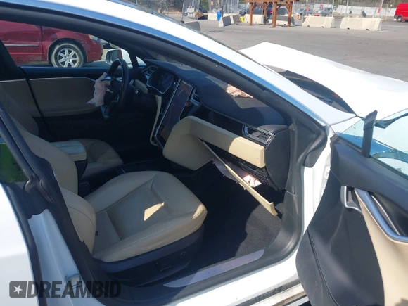2016 Tesla Model S 90D with VIN 5YJSA1E26GF147327, listed as a IAAI auction lot 42077766 with 89,502 mi miles and . Bid and sale history available at DreamBid. Image 5.