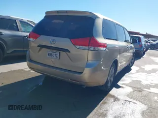 2012 Toyota Sienna with VIN 5TDKA3DC1CS011022, listed as a IAAI auction lot 41415386 with 209,552 mi miles and . Bid and sale history available at DreamBid. Image 4.