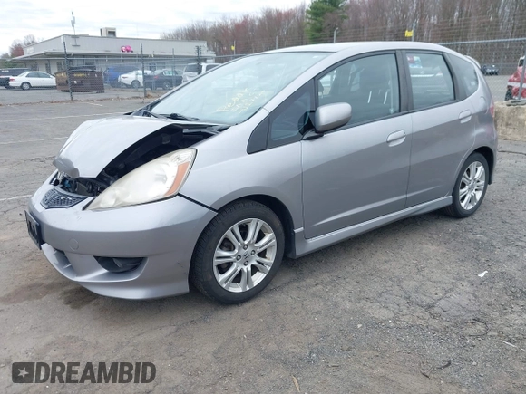 2009 Honda Fit Sport with VIN JHMGE88429S059170, listed as a IAAI auction lot 42091260 with 135,822 mi miles. Bid and sale history available at carsss.com. Image 2.