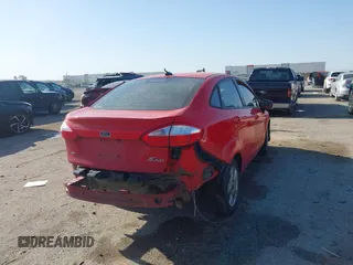 2014 Ford Fiesta SE with VIN 3FADP4BJ9EM174329, listed as a IAAI auction lot 42003743 with 86,744 mi miles. Bid and sale history available at carsss.com. Image 4.