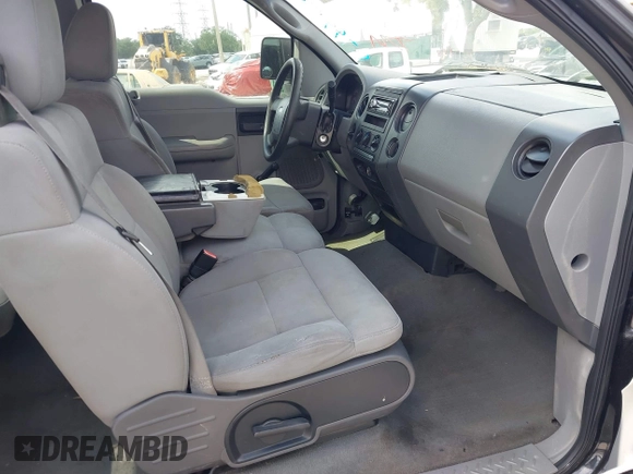 2004 Ford F-150 STX with VIN 1FTRX12W64NB79955, listed as a IAAI auction lot 41939508 with 198,742 mi miles. Bid and sale history available at carsss.com. Image 5.